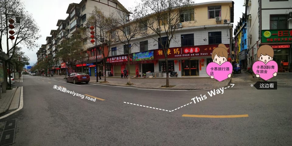 Comma Travel Hotel Inn Avator Mountin-National ParkEast Gate & FREE pick-up and drop-off & FREE Breakfast and Dinne & Free Chinese Tea & Book tickets in advance & Meeting Friends & COFFEE & BEER & Laundry & Party Hostel in Hubei