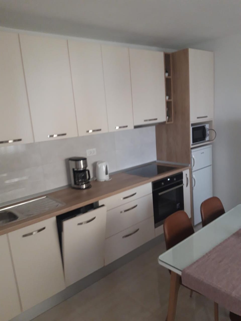 Kitchen or kitchenette, Dining area, dishwasher, microwave, oven, stove, toaster