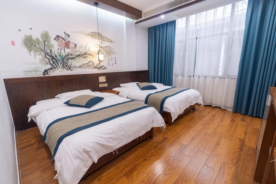 Zhangjiajie Highlights Guesthouse Free Fresh Coffee, Custom Travel Plans, Free Ticket Support, Free Self-service Laundry, Free Water & English-speaking Front Desk Hostel in Hubei