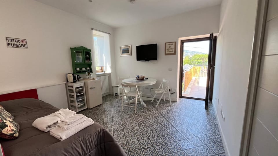 Communal lounge/ TV room, Bed, Dining area