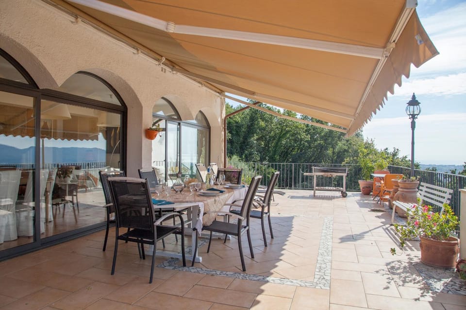 Property building, Patio, Day, View (from property/room), Balcony/Terrace, Seating area, Dining area