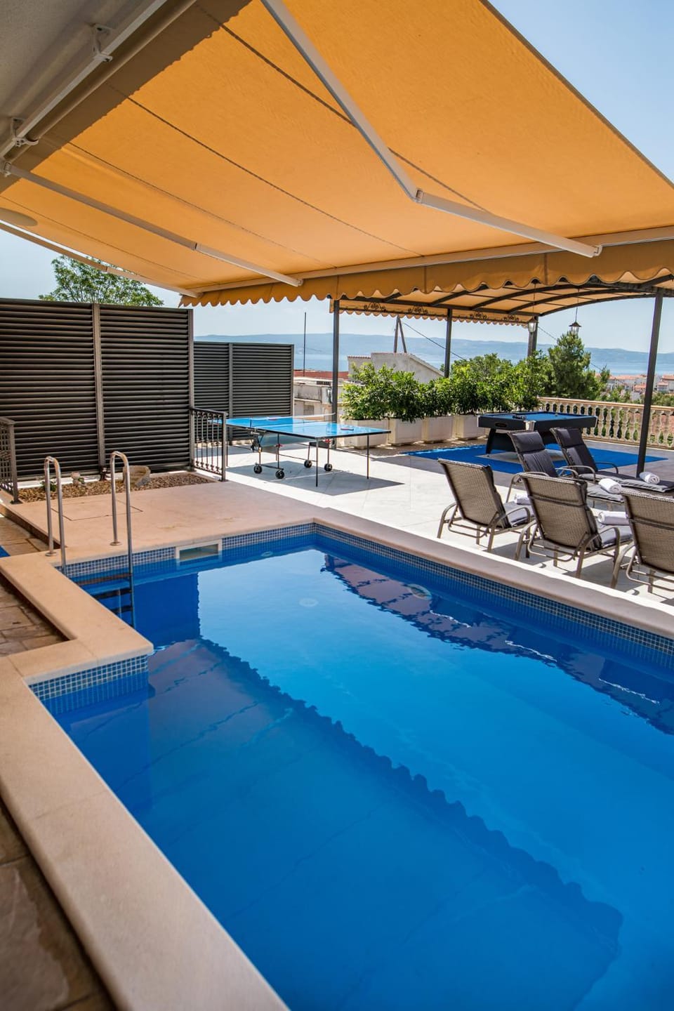 Patio, Day, Pool view, Swimming pool, sunbed