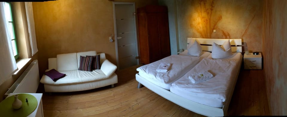 Bed, Seating area, Bedroom