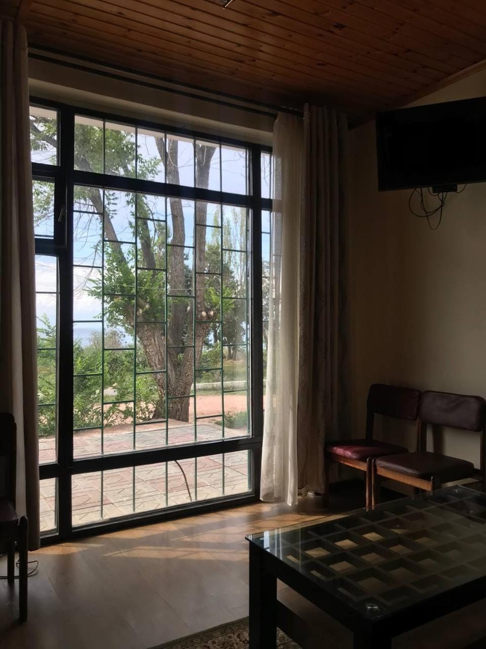 TV and multimedia, View (from property/room), Living room, Seating area, Dining area, Garden view, Lake view