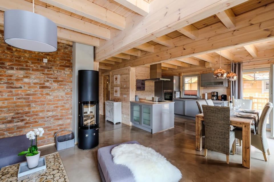 Property building, Coffee/tea facilities, Kitchen or kitchenette, Living room, Seating area, Dining area