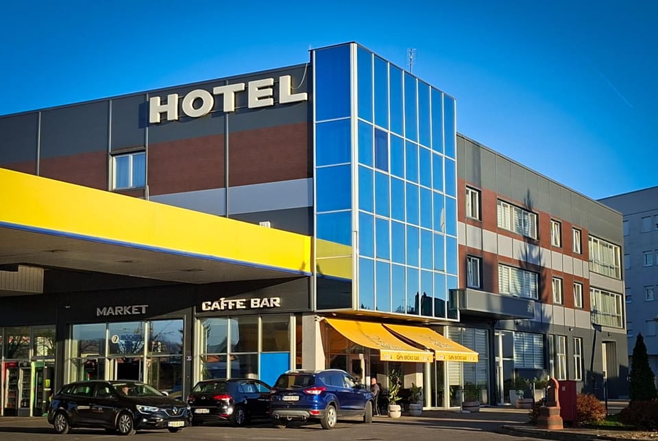 Property building, Day, City view, Street view, Location, Parking