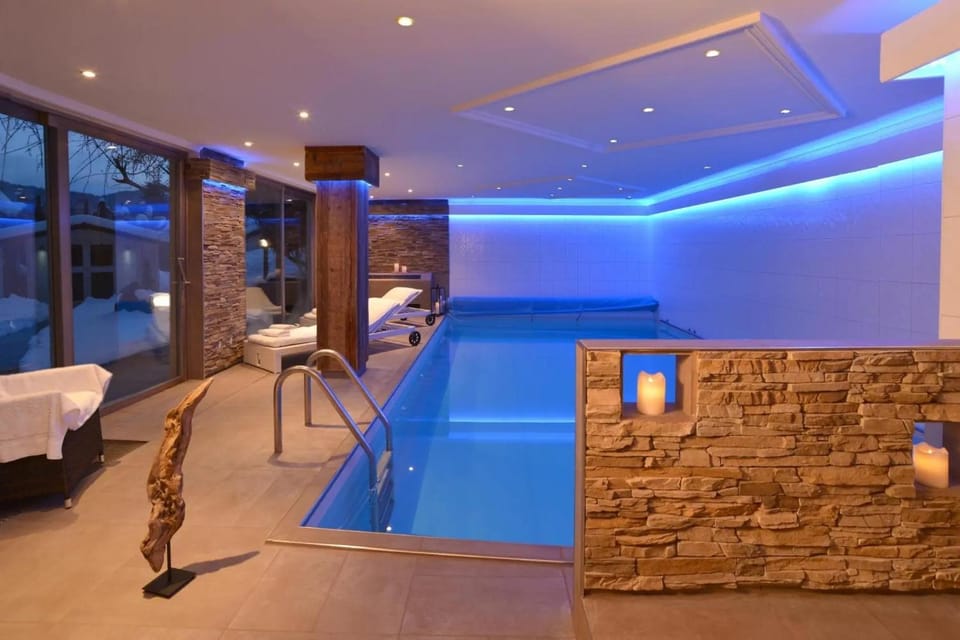 Property building, Living room, Swimming pool
