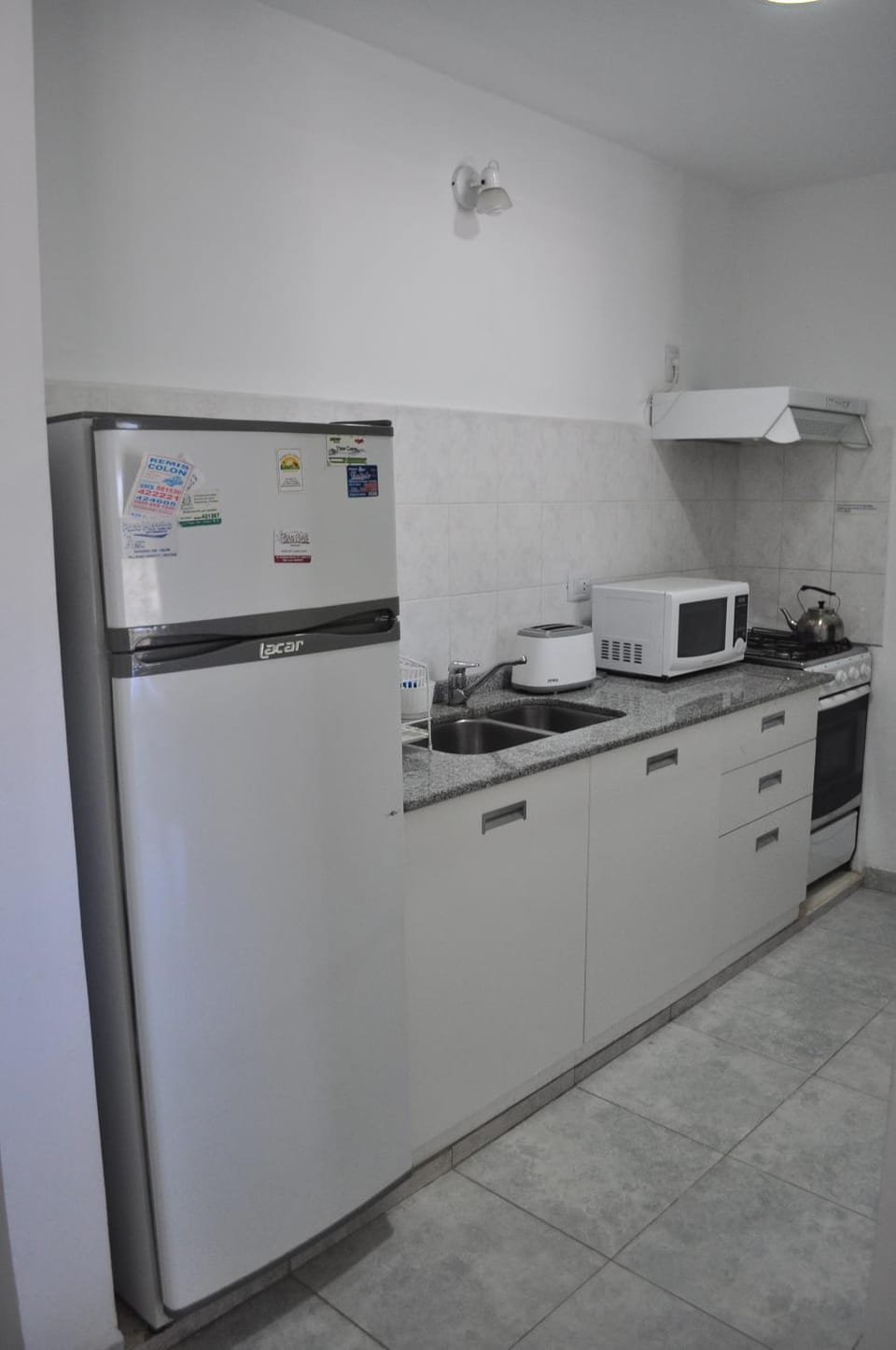 Kitchen or kitchenette, oven, stove