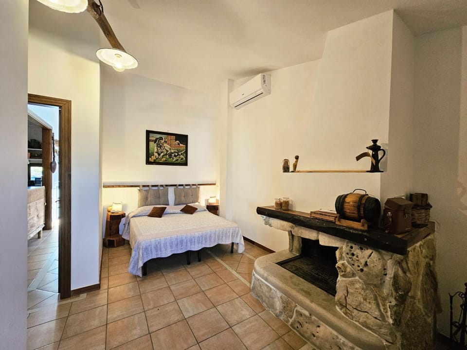 Bed, Bedroom, fireplace, air conditioner