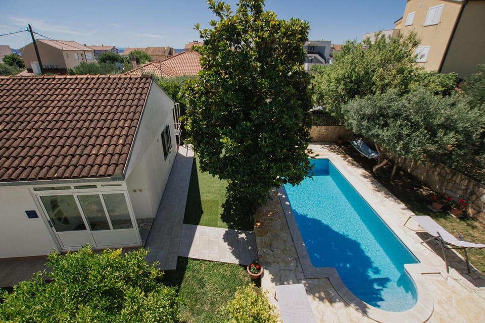 Facade/entrance, Neighbourhood, Garden, Swimming pool