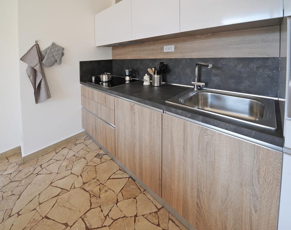 Kitchen or kitchenette, stove