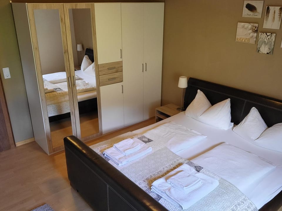 Bed, Photo of the whole room, Bedroom, towels, wardrobe