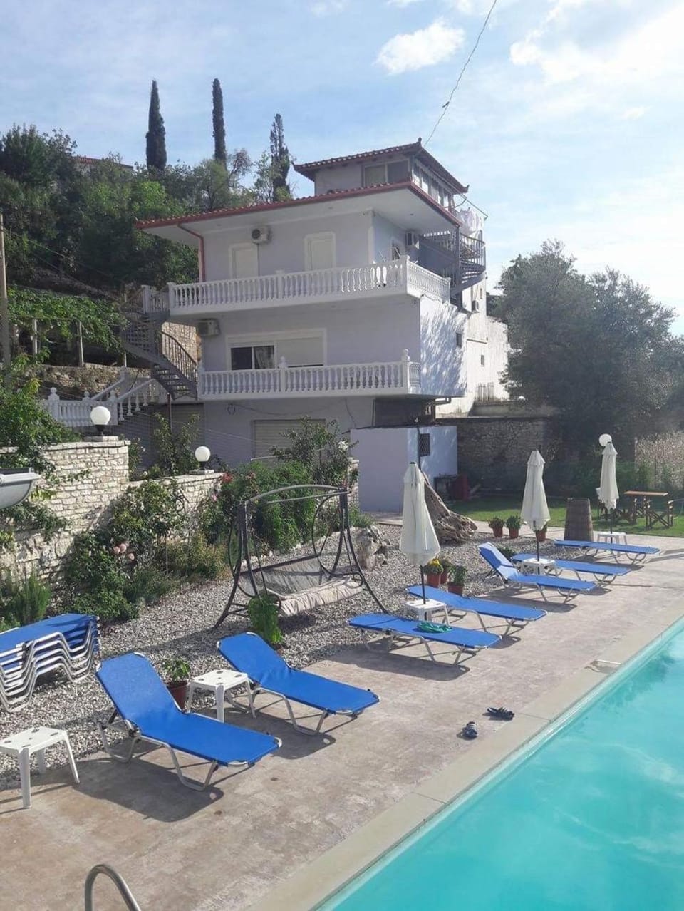 Property building, Day, Pool view, Swimming pool, sunbed
