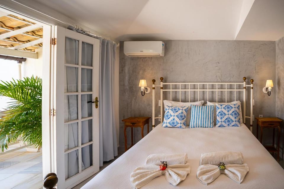 Bed, Photo of the whole room, Bedroom, towels, air conditioner