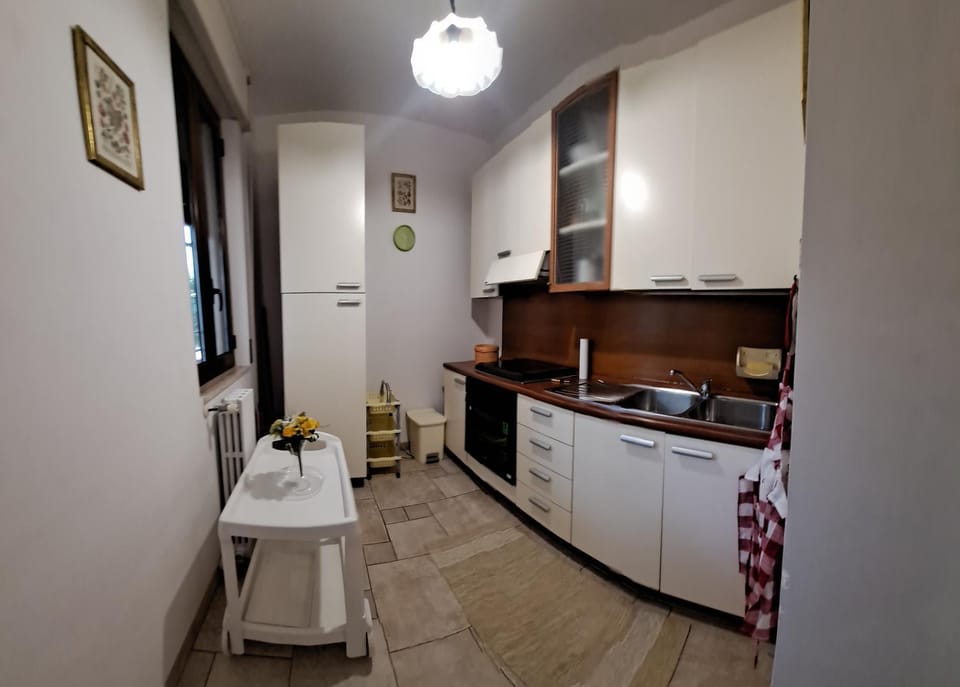 Kitchen or kitchenette, oven