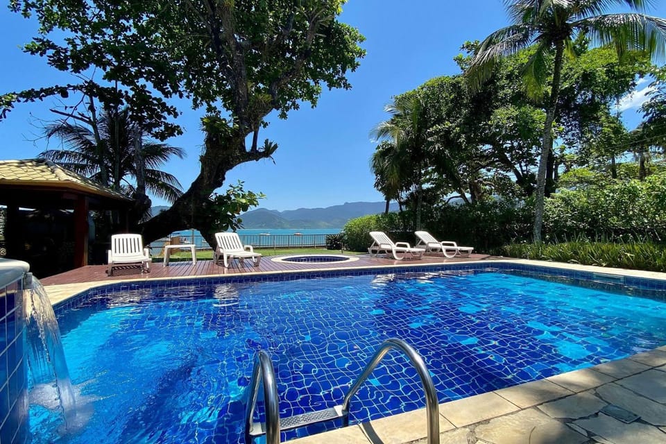 Magnífica casa pé na areia 4 suítes c/ ar e piscina House in State of São Paulo