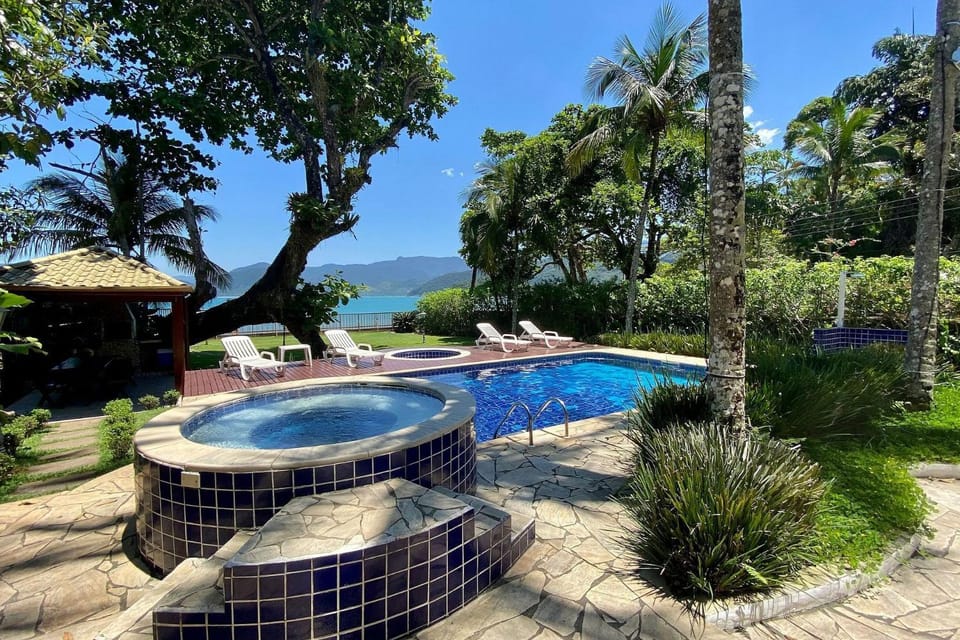 Magnífica casa pé na areia 4 suítes c/ ar e piscina House in State of São Paulo