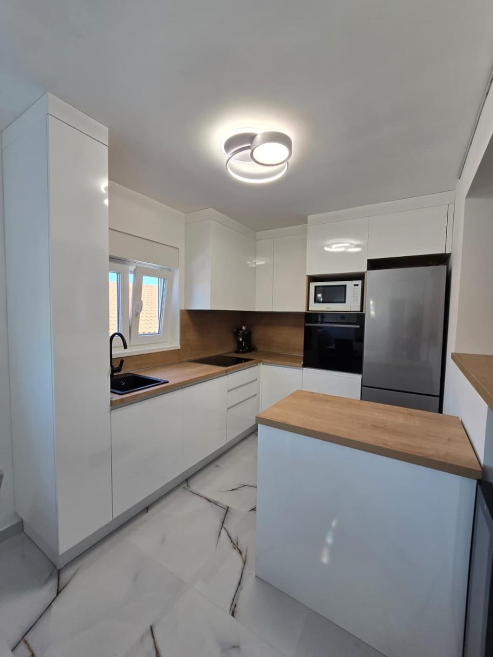 Kitchen or kitchenette, stove, kitchen
