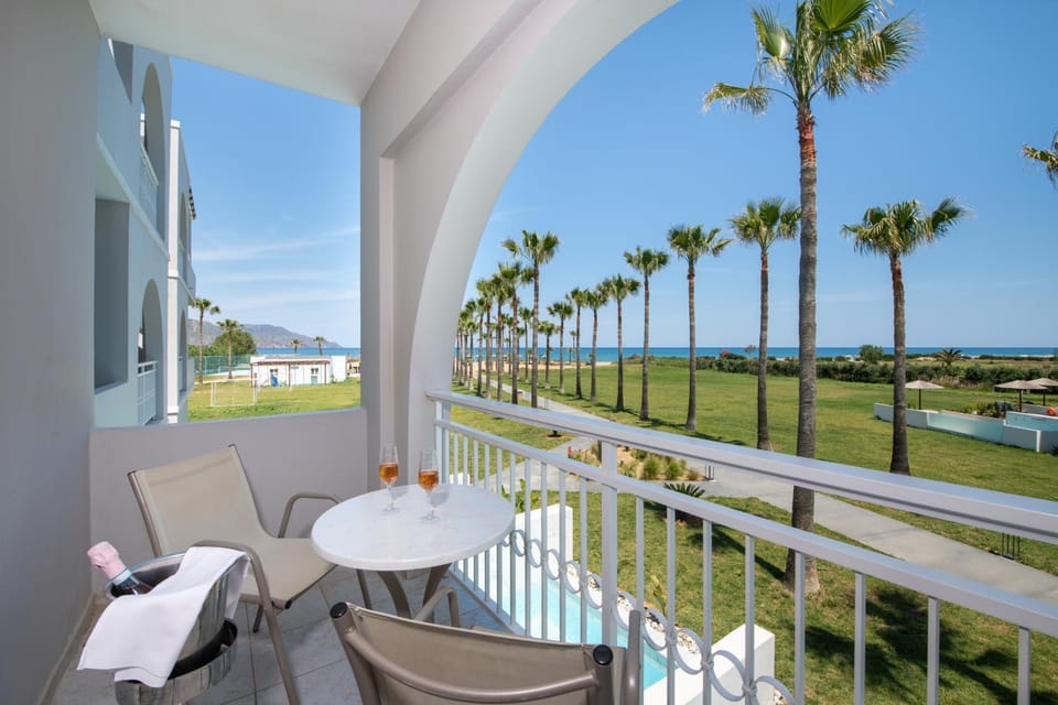 View (from property/room), Balcony/Terrace, Seating area, Garden view, Sea view