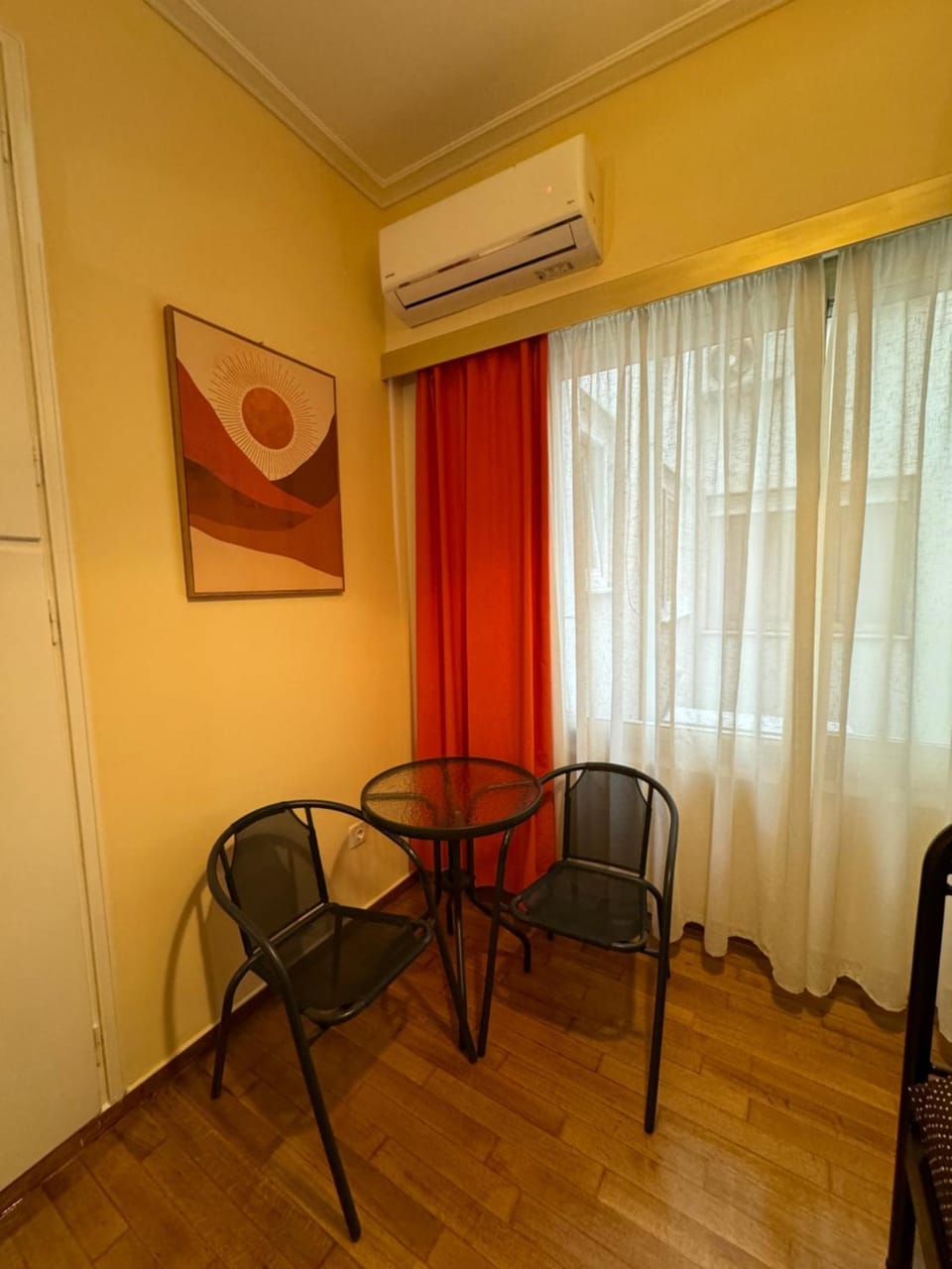 Photo of the whole room, air conditioner