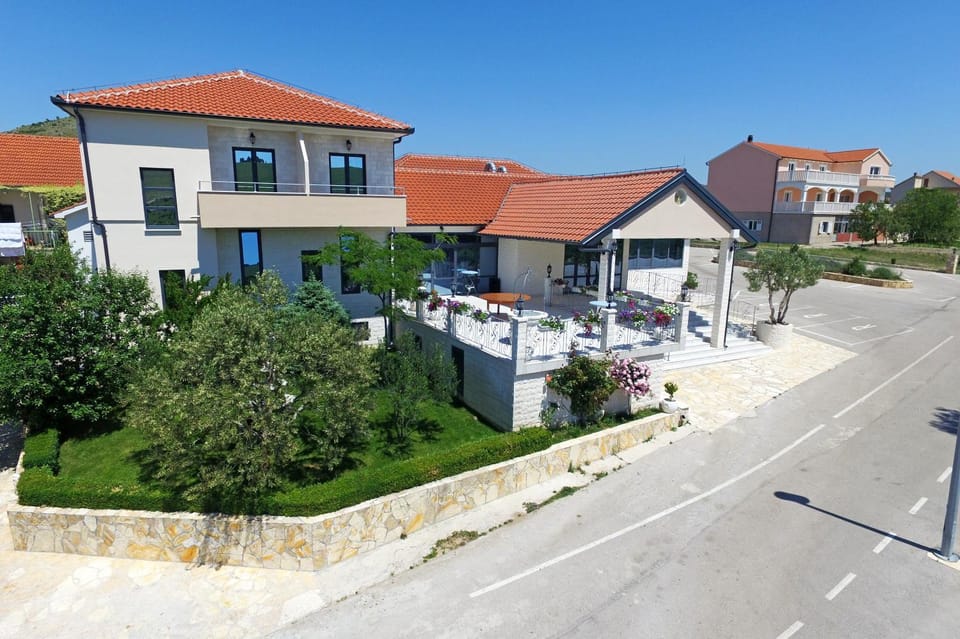 Property building, Facade/entrance, Off site, Day, Summer, Street view
