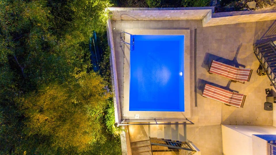 Property building, Night, Swimming pool