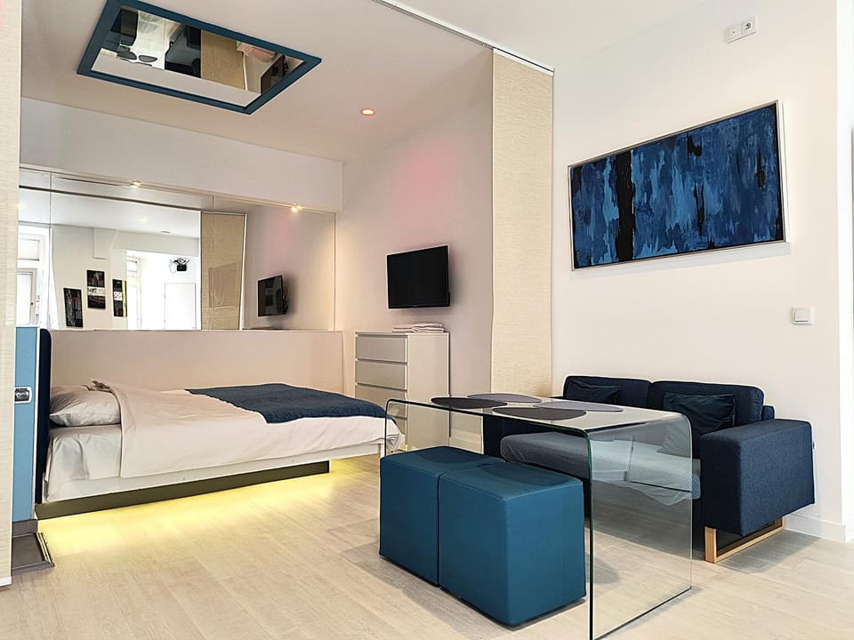 Bed, Living room, Seating area, Bedroom