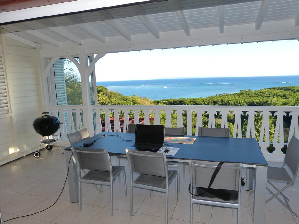 Patio, Seating area, Dining area, Sea view