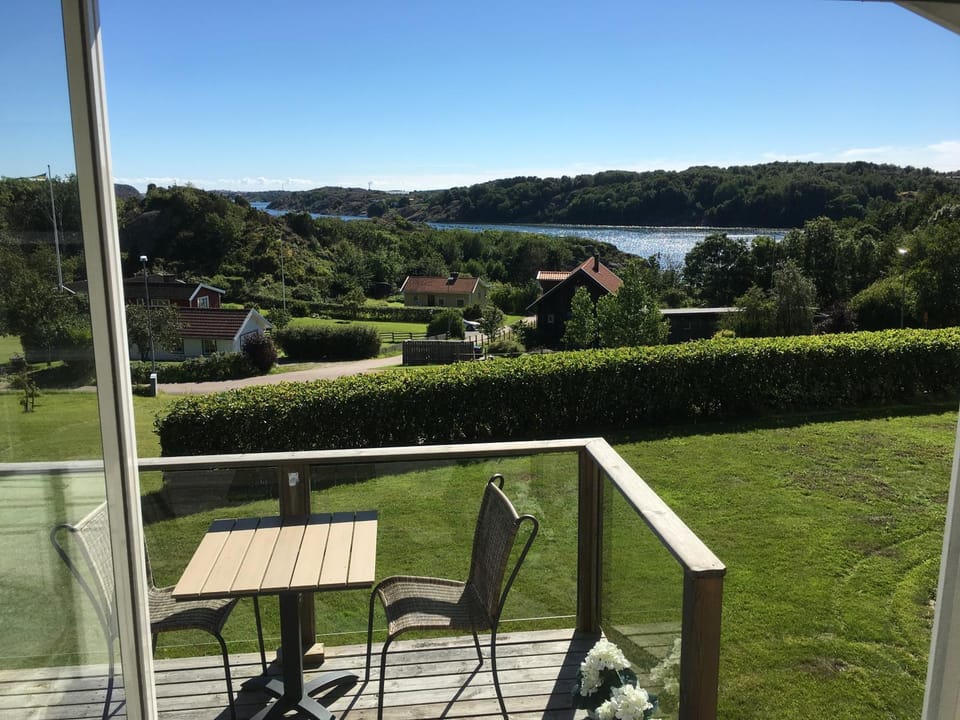 Property building, Patio, Natural landscape, View (from property/room), Dining area, Mountain view, Sea view