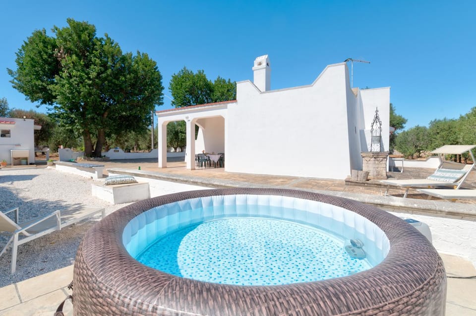 Property building, Patio, Pool view, sunbed