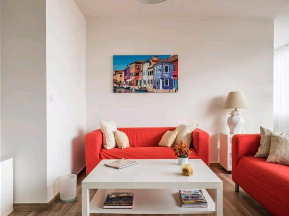 TV and multimedia, Living room, Lounge or bar, Seating area, locker, air conditioner