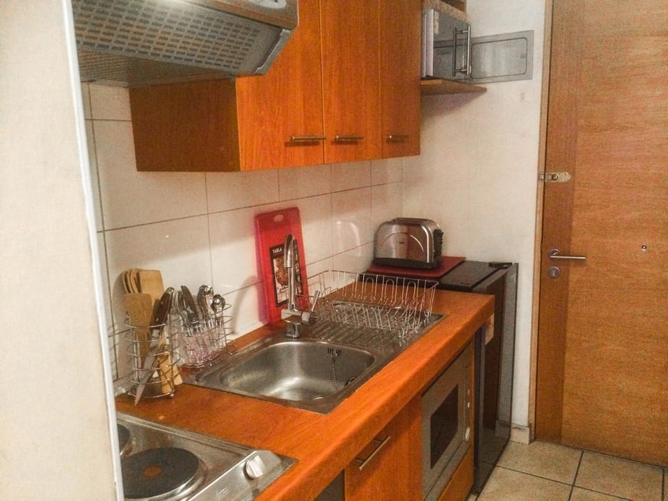 Kitchen or kitchenette, oven, stove