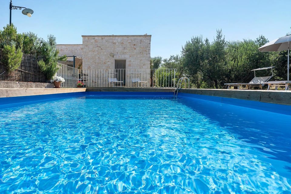 Property building, Living room, Swimming pool