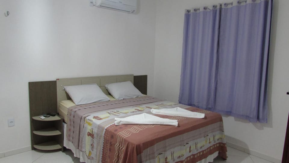 Bed, Bedroom, towels, air conditioner