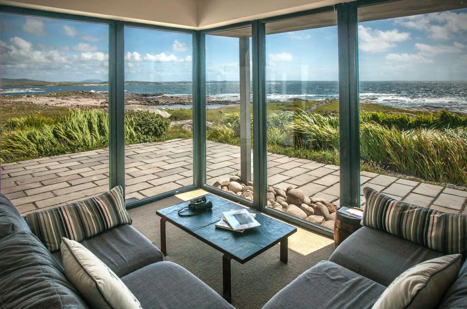 Natural landscape, View (from property/room), Living room, Seating area, Sea view