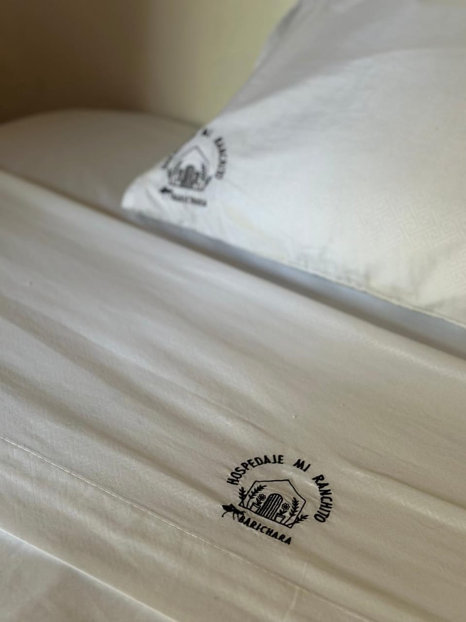 Bed, Property logo or sign