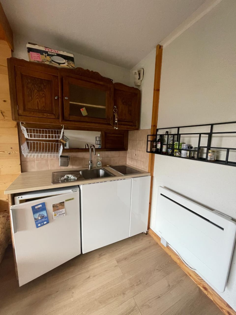 Kitchen or kitchenette, storage, stove