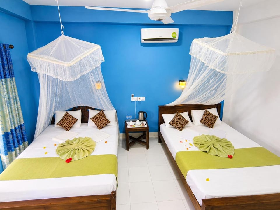 Bed, Photo of the whole room, Bedroom, towels, air conditioner