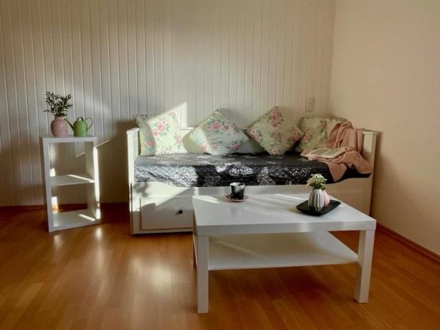 Bed, Living room, Seating area