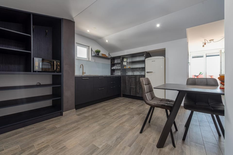 Kitchen or kitchenette, microwave