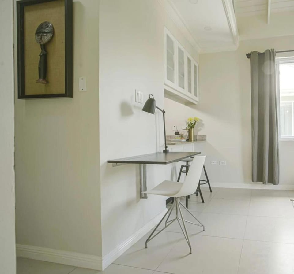 Choose To Be Happy at EI8HT - Super Studios and 1-BR Penthouse Apartment Apartment in Kingston