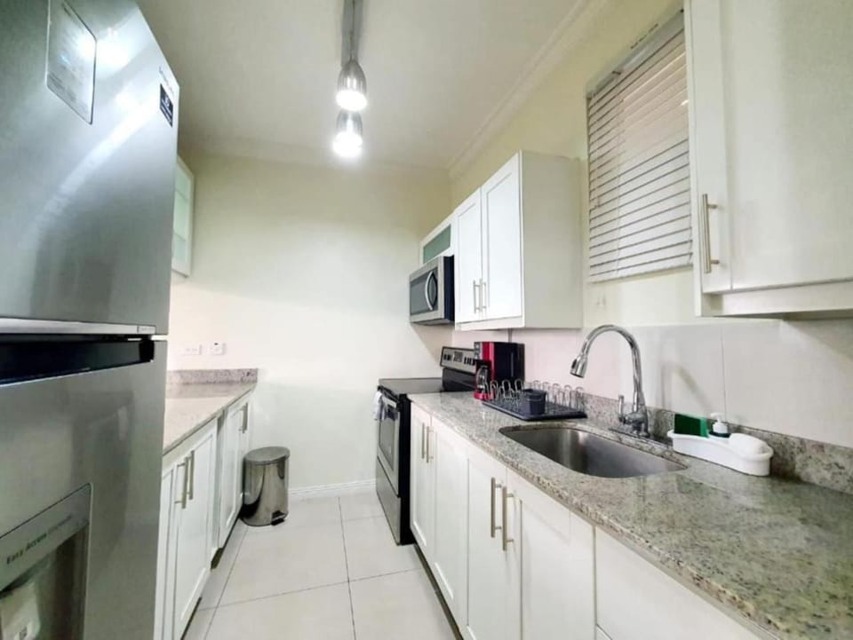 Choose To Be Happy at EI8HT - Super Studios and 1-BR Penthouse Apartment Apartment in Kingston