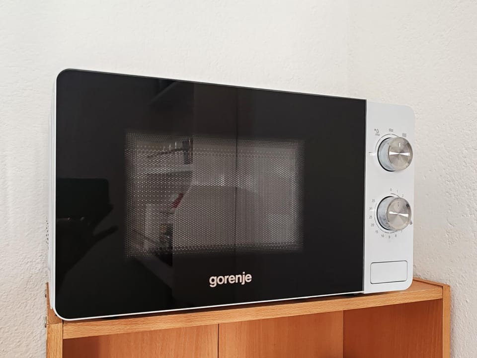 Kitchen or kitchenette, microwave