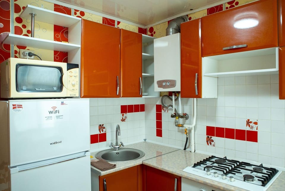 Kitchen or kitchenette, stove