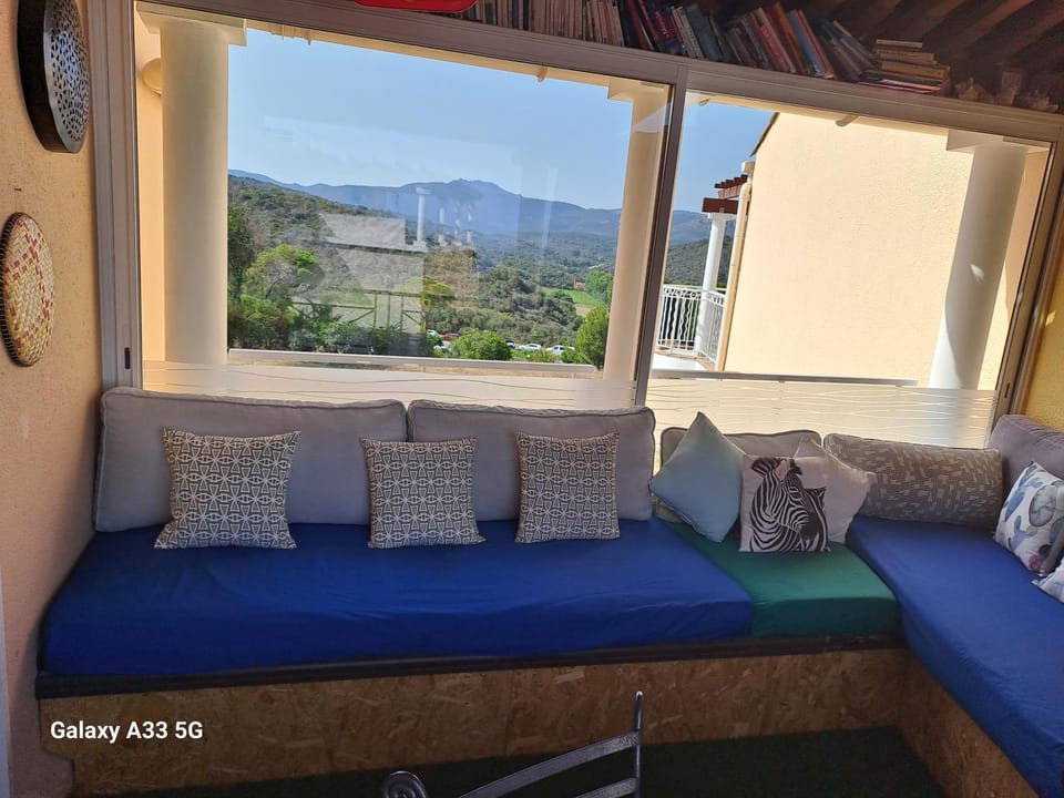 Natural landscape, Library, Living room, Seating area, Mountain view