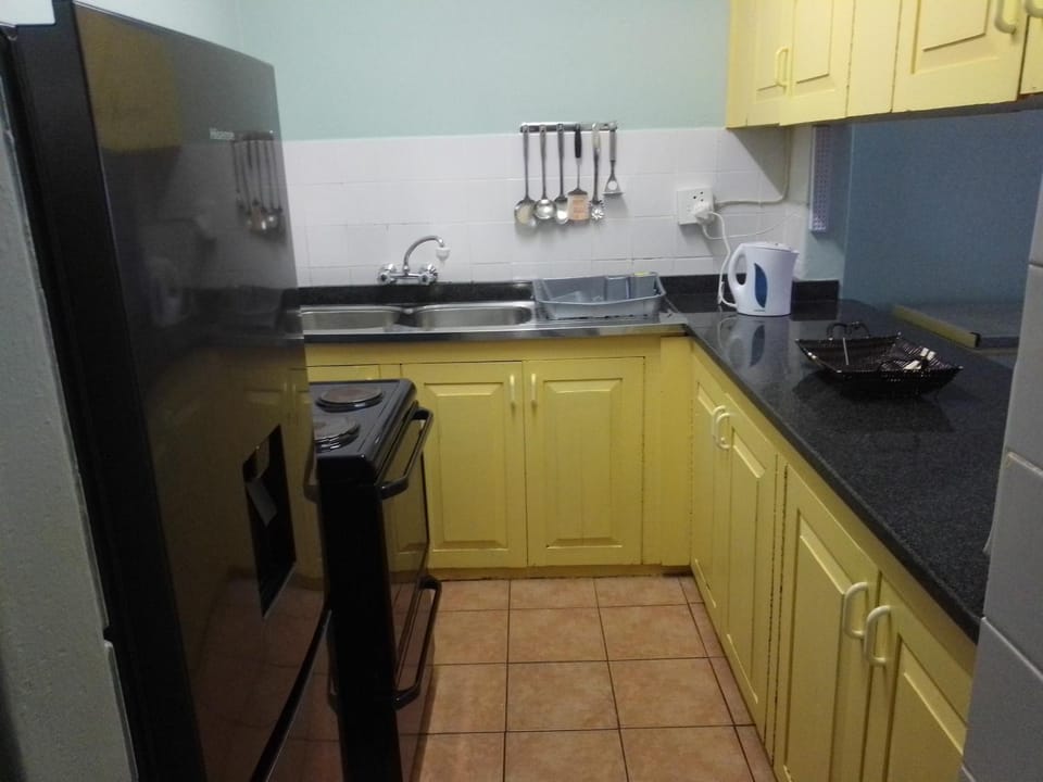 Kitchen or kitchenette, oven, stove