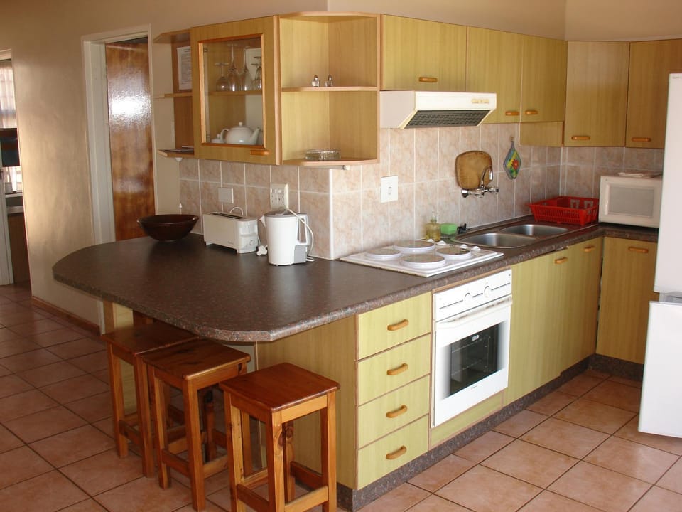Coffee/tea facilities, Kitchen or kitchenette, Living room, Dining area, On site