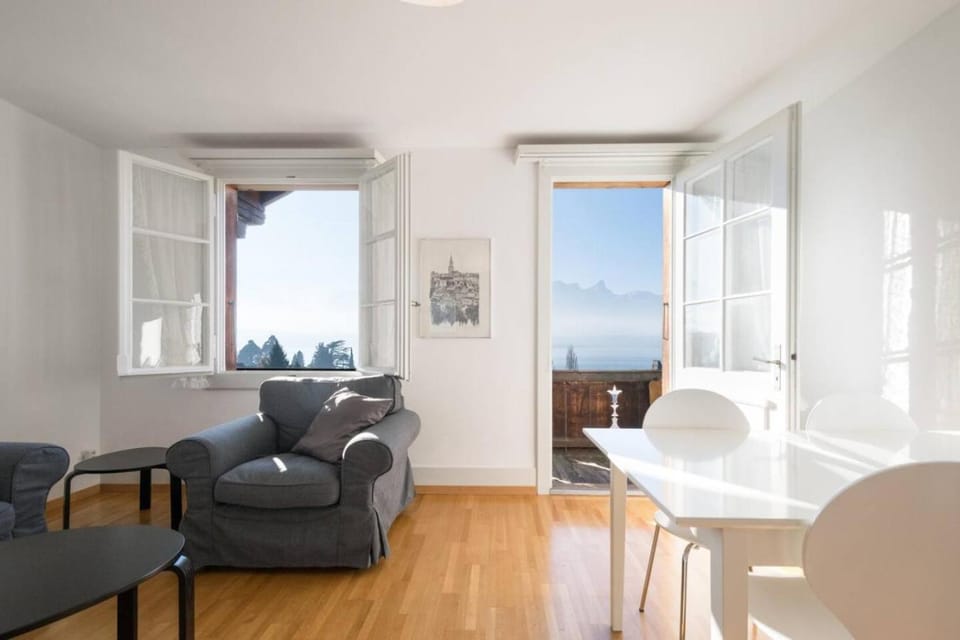 Natural landscape, Living room, Seating area, Dining area, Lake view, Mountain view