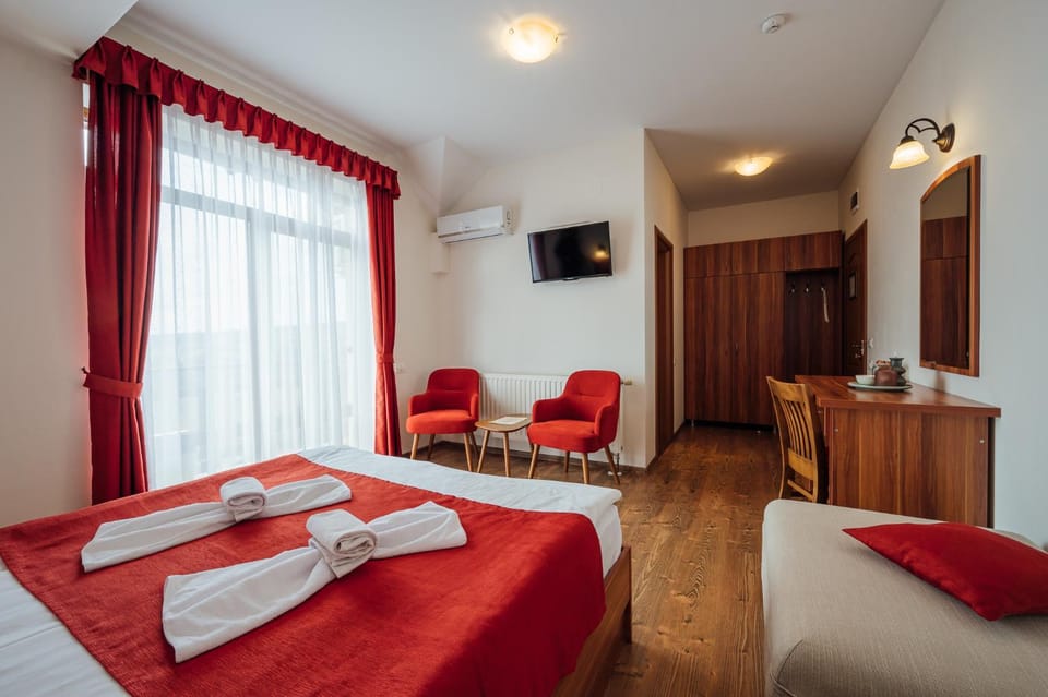 Photo of the whole room, Seating area, towels, air conditioner
