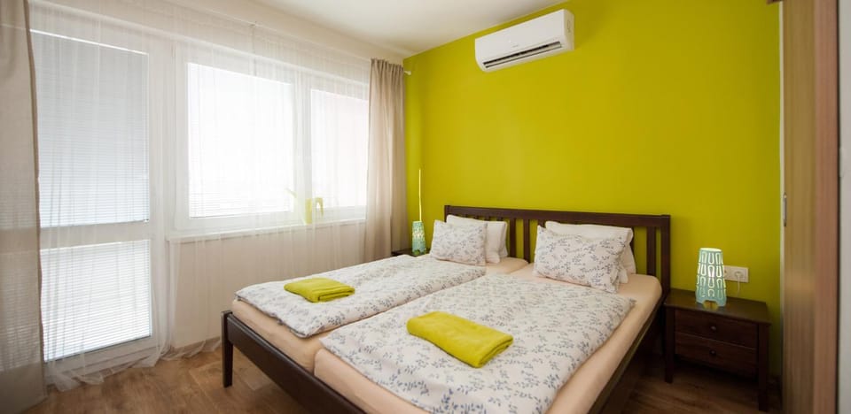 Bed, Photo of the whole room, Bedroom, towels, air conditioner